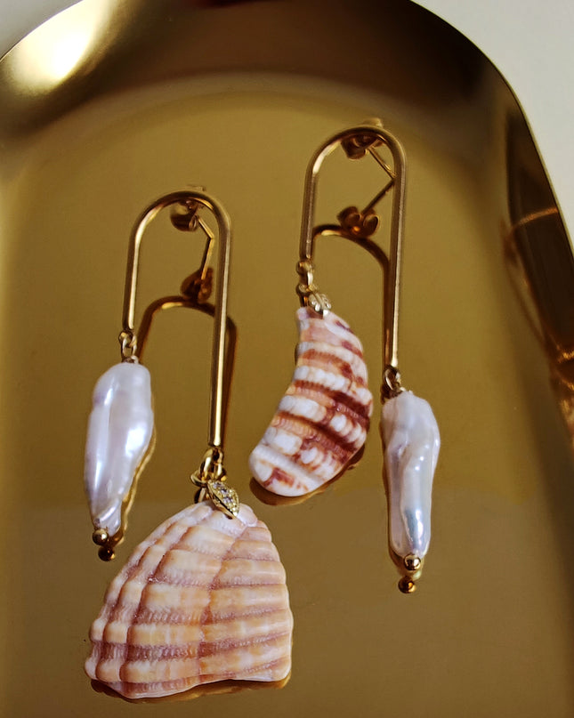 Conchas y perlas