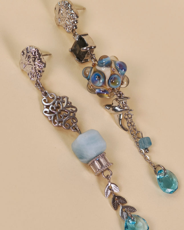 Seductive Asymmetry with Swarovski crystals